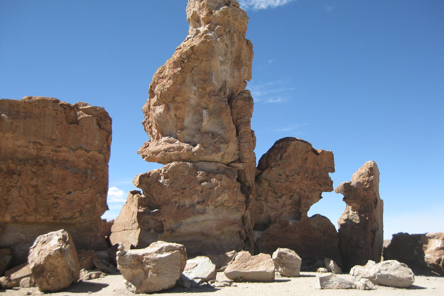 Large rock formations at valle de las rocas against a clear blue sky