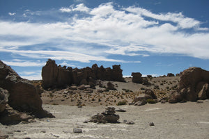 Valle de las rocas landscape with rocky formations and a blue sky with clouds