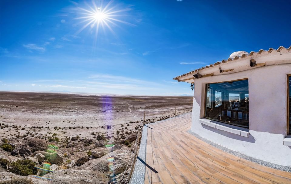 Panoramic terrace overlooking the immense landscape of the Uyuni Salt Flats.